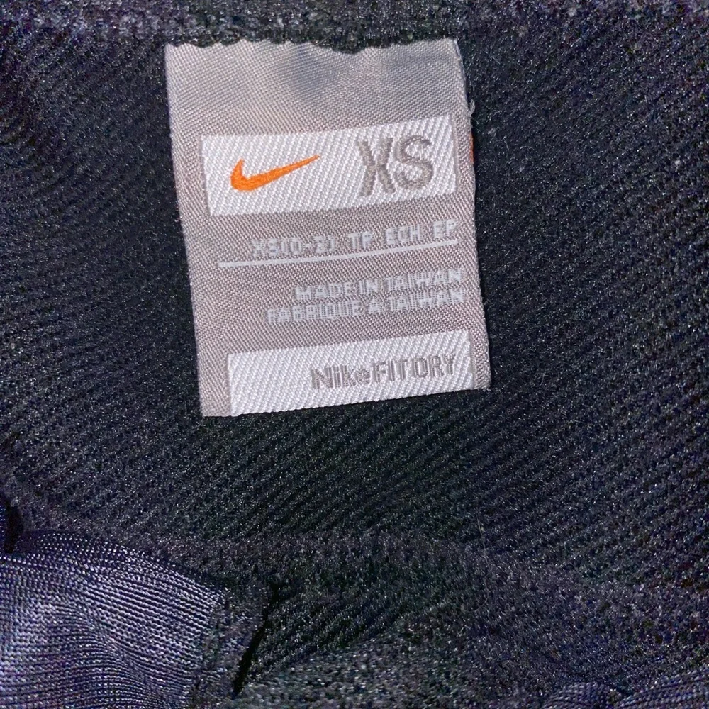 NIKE FIT DRY, SIZE XS (0-2), Black with reflective strip along zippered ankles - Picture 3 of 4